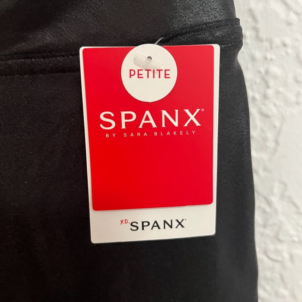 spanx black faux leather leggings.